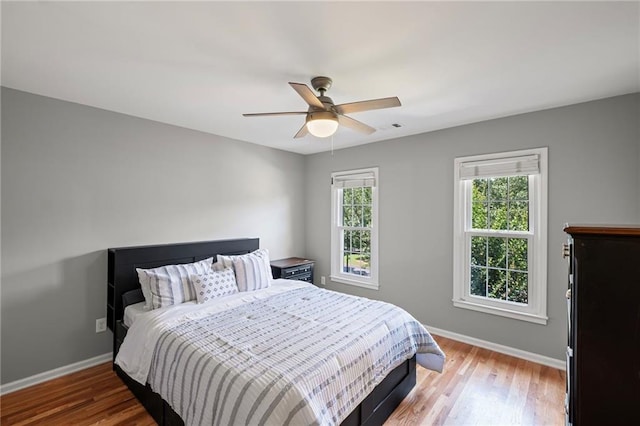 14270 Morning Mountain Way, Milton, GA 30004 - bedroom with light wood-style floors and ceiling fan