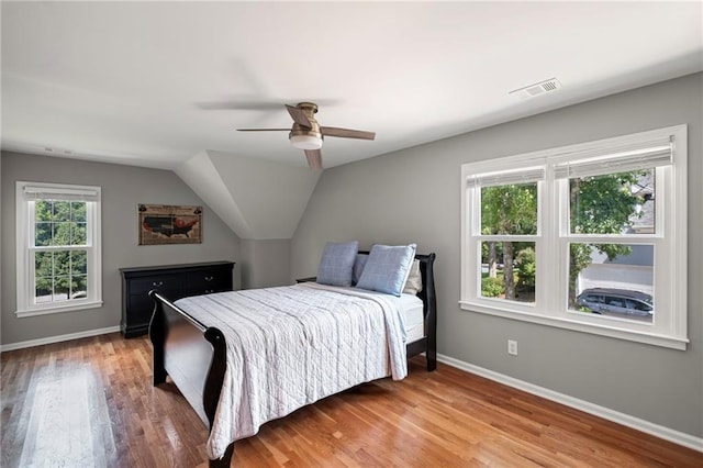 14270 Morning Mountain Way, Milton, GA 30004 - bedroom featuring wood finished floors, a ceiling fan, and vaulted ceiling