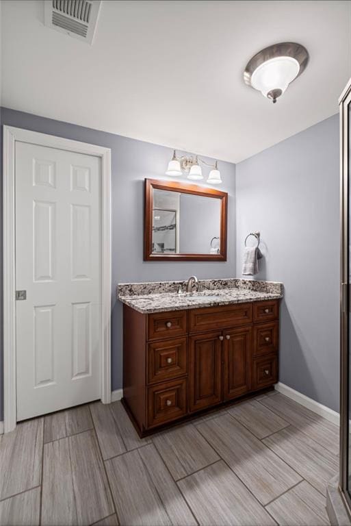 14270 Morning Mountain Way, Milton, GA 30004 - bathroom with vanity and wood finish floors