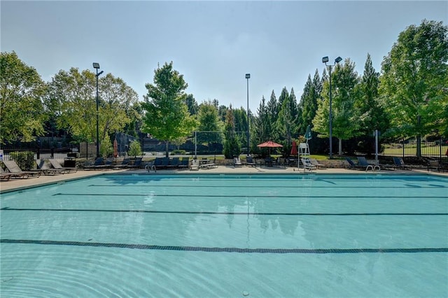 14270 Morning Mountain Way, Milton, GA 30004 - community pool with a patio area and view of wooded area