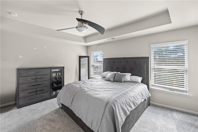 133 Worthing Ln, Fairburn, GA 30213 - bedroom featuring carpet, a raised ceiling, and a ceiling fan