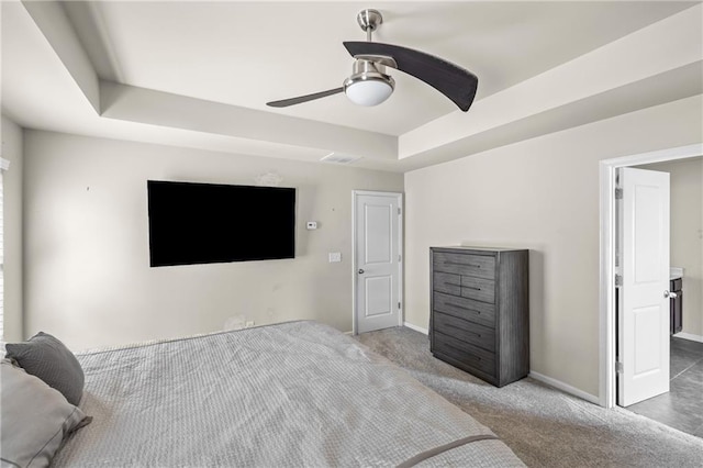 133 Worthing Ln, Fairburn, GA 30213 - carpeted bedroom with a ceiling fan and a tray ceiling