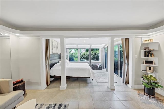 tiled bedroom with access to outside