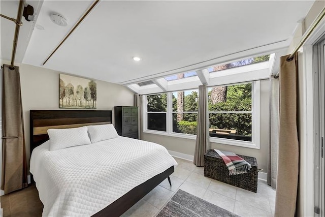 bedroom with light tile patterned floors