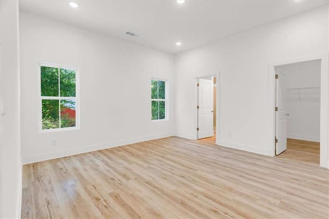 614 Glendale Rd, Scottdale, GA 30079 - empty room featuring light wood-style flooring, recessed lighting, and baseboards