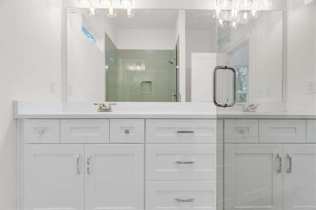 614 Glendale Rd, Scottdale, GA 30079 - bathroom featuring double vanity and a stall shower