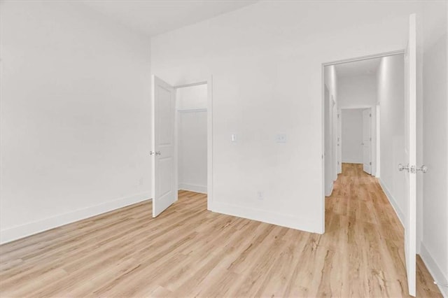 614 Glendale Rd, Scottdale, GA 30079 - empty room with light wood-style flooring and baseboards