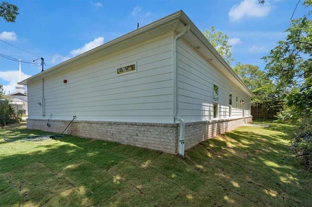 614 Glendale Rd, Scottdale, GA 30079 - view of side of home with a yard