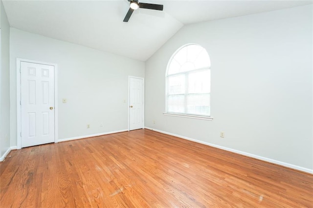 4400 Old Allgood Cir, Stone Mountain, GA 30083 - unfurnished room featuring a ceiling fan, lofted ceiling, light wood-style floors, and baseboards