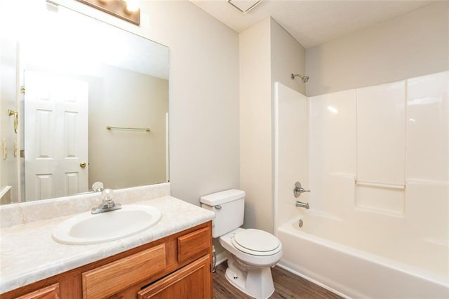 4400 Old Allgood Cir, Stone Mountain, GA 30083 - bathroom with toilet, wood finished floors, bathtub / shower combination, and vanity
