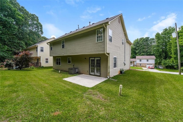 4400 Old Allgood Cir, Stone Mountain, GA 30083 - back of property featuring french doors, a yard, a patio area, and central AC unit