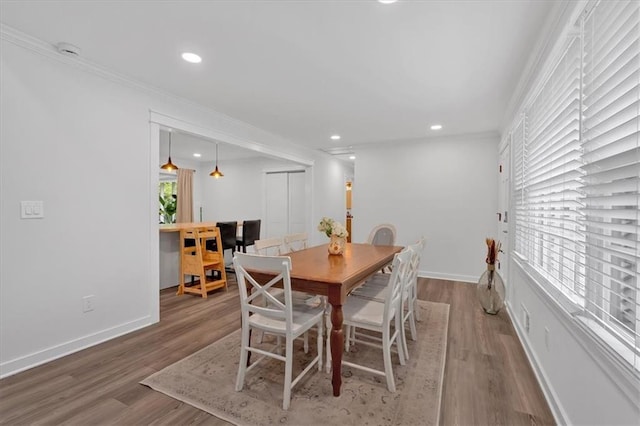 597 Rich Davis Rd, Hiram, GA 30141 - dining space with wood finished floors, recessed lighting, baseboards, and crown molding