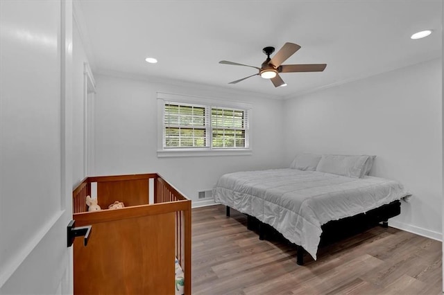597 Rich Davis Rd, Hiram, GA 30141 - bedroom featuring wood finished floors, baseboards, ceiling fan, recessed lighting, and ornamental molding