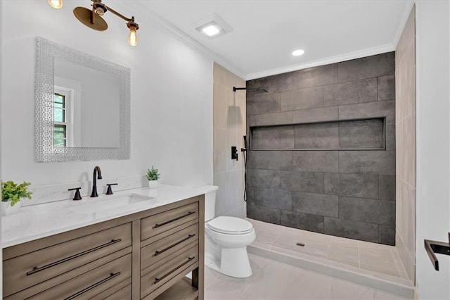 597 Rich Davis Rd, Hiram, GA 30141 - bathroom featuring toilet, vanity, tiled shower, and crown molding