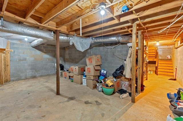 597 Rich Davis Rd, Hiram, GA 30141 - unfinished basement featuring stairway and concrete block wall
