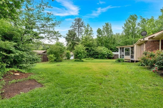 597 Rich Davis Rd, Hiram, GA 30141 - view of green lawn featuring a sunroom