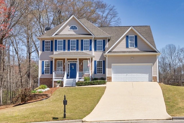 49 Inverness Ct, Hiram, GA 30141 - view of front facade featuring covered porch, concrete driveway, a front yard, and a shingled roof