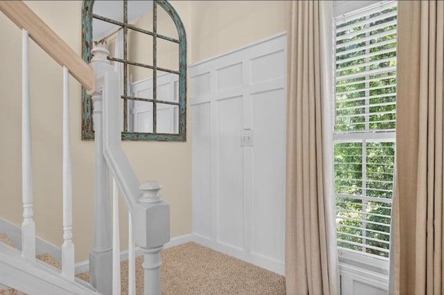49 Inverness Ct, Hiram, GA 30141 - foyer entrance featuring a decorative wall, carpet flooring, and stairway