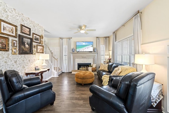 49 Inverness Ct, Hiram, GA 30141 - living area featuring ceiling fan, stairs, dark wood-type flooring, and a fireplace