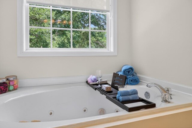 49 Inverness Ct, Hiram, GA 30141 - bathroom featuring double vanity, a stall shower, a bath, and vaulted ceiling