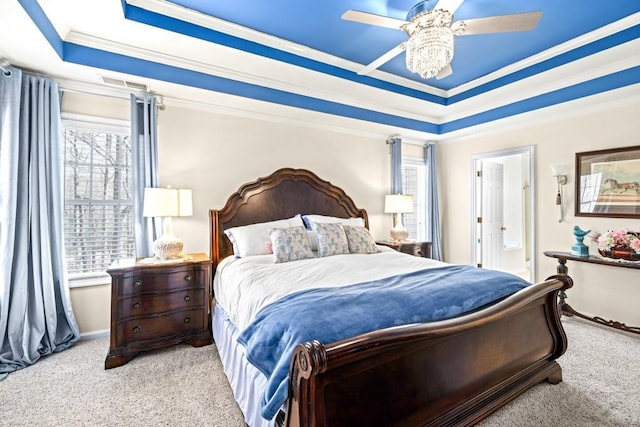 49 Inverness Ct, Hiram, GA 30141 - carpeted bedroom with a raised ceiling, ornamental molding, baseboards, ceiling fan, and ensuite bath