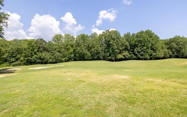 49 Inverness Ct, Hiram, GA 30141 - view of property's community with golf course view, view of wooded area, and a lawn