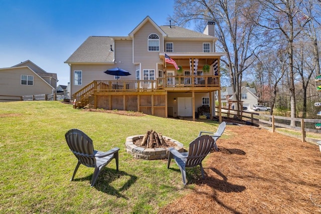 49 Inverness Ct, Hiram, GA 30141 - rear view of property with an outdoor fire pit, a wooden deck, a chimney, stairs, and a shingled roof