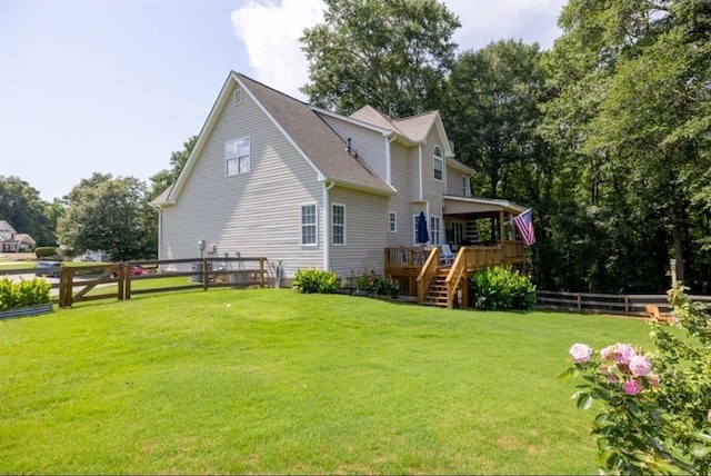 49 Inverness Ct, Hiram, GA 30141 - rear view of house featuring stairs, a wooden deck, and a fenced backyard