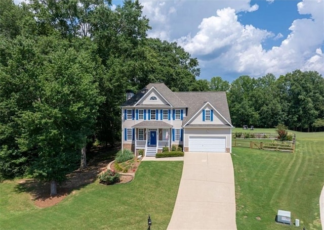 49 Inverness Ct, Hiram, GA 30141 - colonial inspired home featuring driveway, a front yard, a garage, and a porch