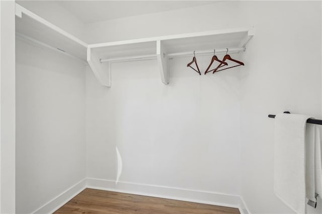 walk in closet featuring hardwood / wood-style floors