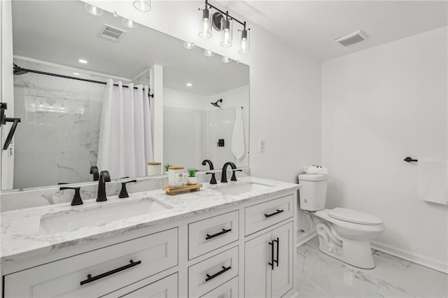 bathroom with vanity, a shower with curtain, and toilet