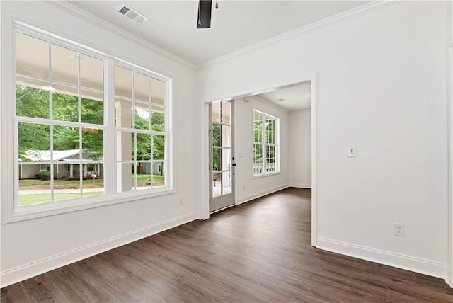 200 College Ave, Commerce, GA 30529 - spare room with baseboards, ornamental molding, and dark wood-style floors