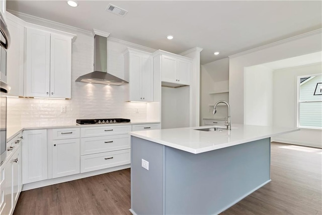 200 College Ave, Commerce, GA 30529 - kitchen with a sink, wall chimney exhaust hood, dark wood-type flooring, black cooktop, and white cabinetry