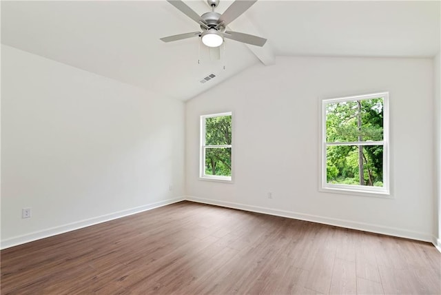 200 College Ave, Commerce, GA 30529 - empty room featuring healthy amount of natural light, a ceiling fan, and dark wood finished floors