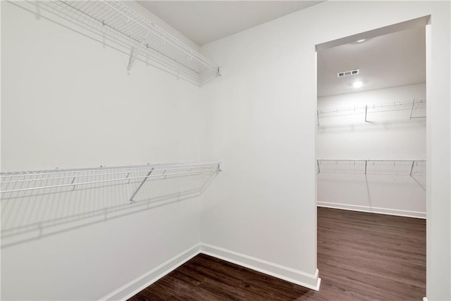200 College Ave, Commerce, GA 30529 - spacious closet featuring wood finished floors