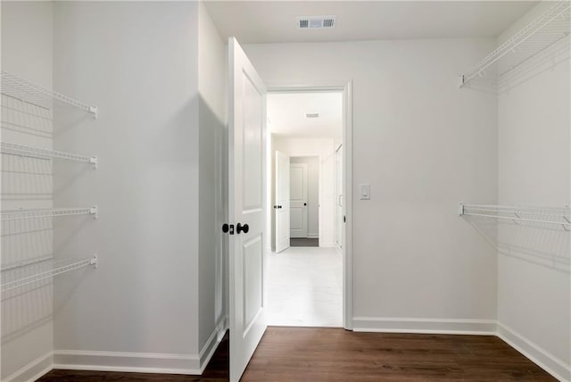 200 College Ave, Commerce, GA 30529 - walk in closet with wood finished floors