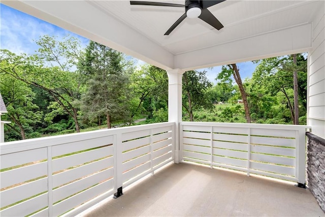 200 College Ave, Commerce, GA 30529 - view of patio / terrace with ceiling fan, view of wooded area, and a balcony