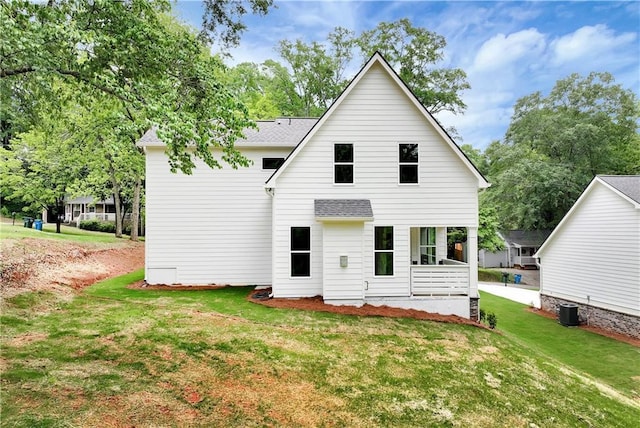 200 College Ave, Commerce, GA 30529 - rear view of house featuring a yard and central AC