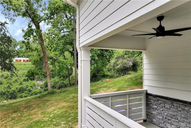 200 College Ave, Commerce, GA 30529 - deck featuring a ceiling fan and a lawn