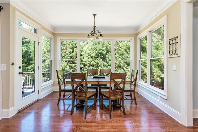 sunroom with a chandelier and plenty of natural light