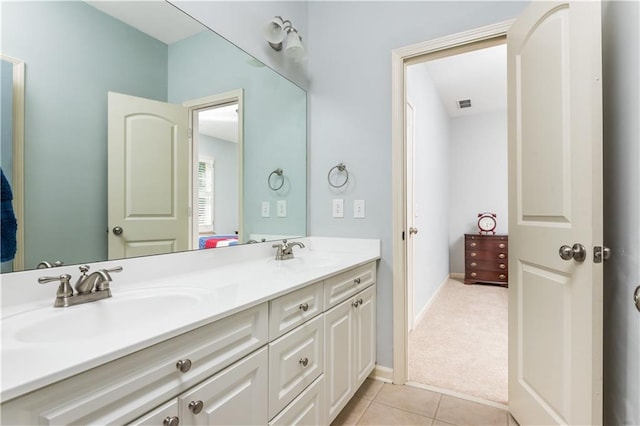 bathroom with vanity and tile patterned floors