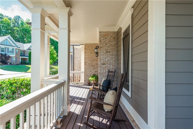 balcony featuring a porch