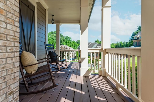 deck featuring covered porch