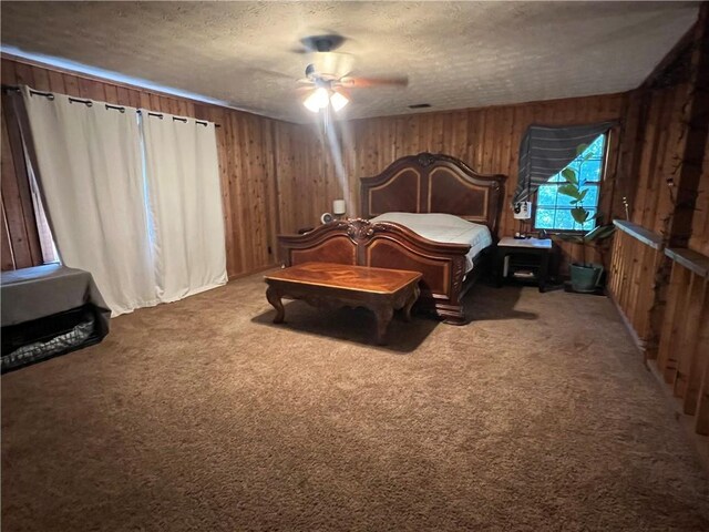 6245 Bannister Rd, Cumming, GA 30028 - bedroom featuring carpet, wooden walls, a ceiling fan, and a textured ceiling