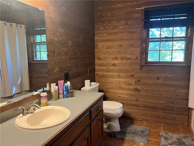 6245 Bannister Rd, Cumming, GA 30028 - full bathroom featuring toilet, wood walls, and vanity