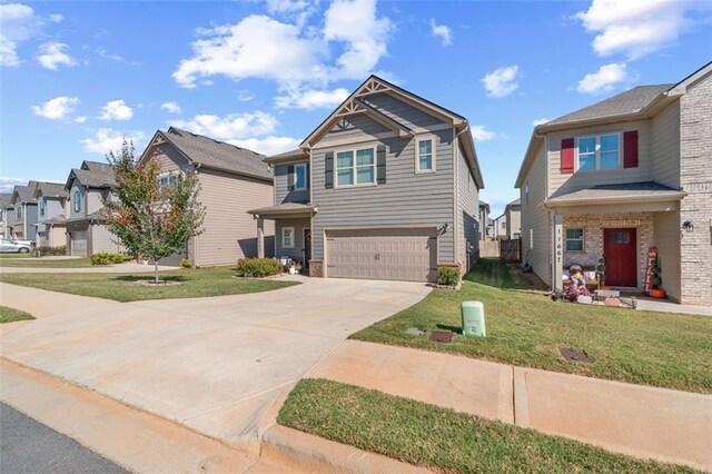 craftsman-style home with a front lawn and a garage