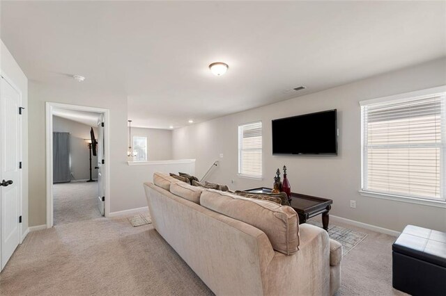 living room featuring light colored carpet