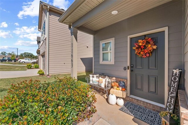 doorway to property featuring a garage