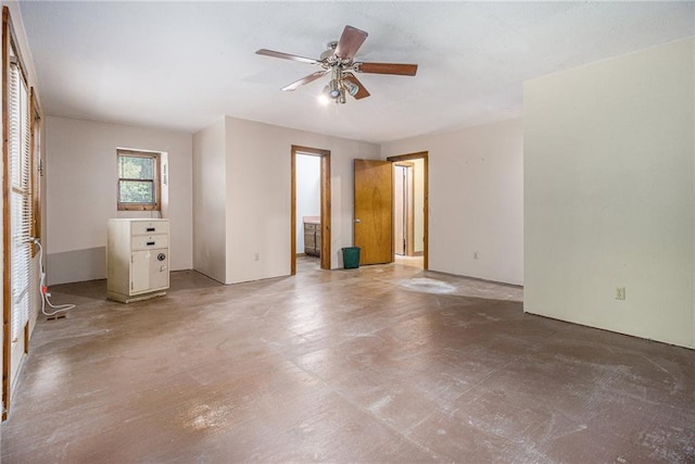 unfurnished bedroom with concrete floors