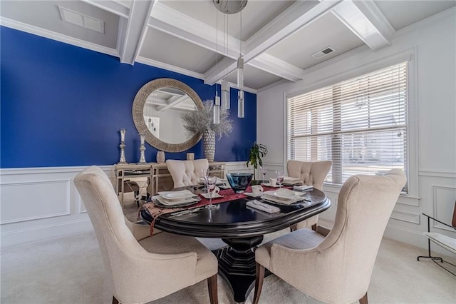 dining area featuring visible vents, beamed ceiling, carpet floors, a decorative wall, and coffered ceiling